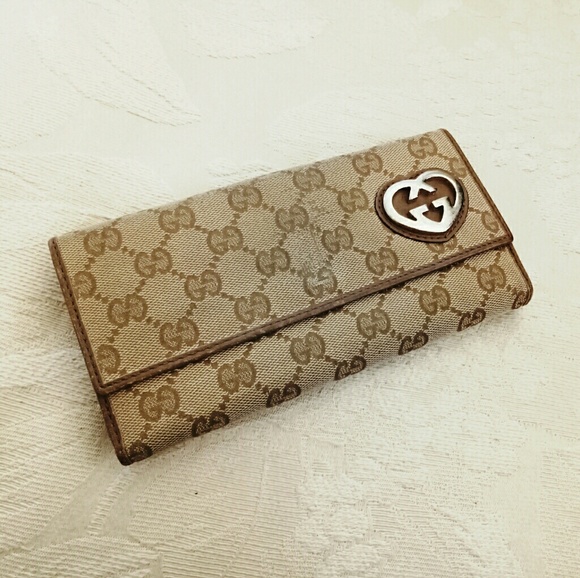 Gucci Handbags - Auth Gucci canvas GG long trifold wallet